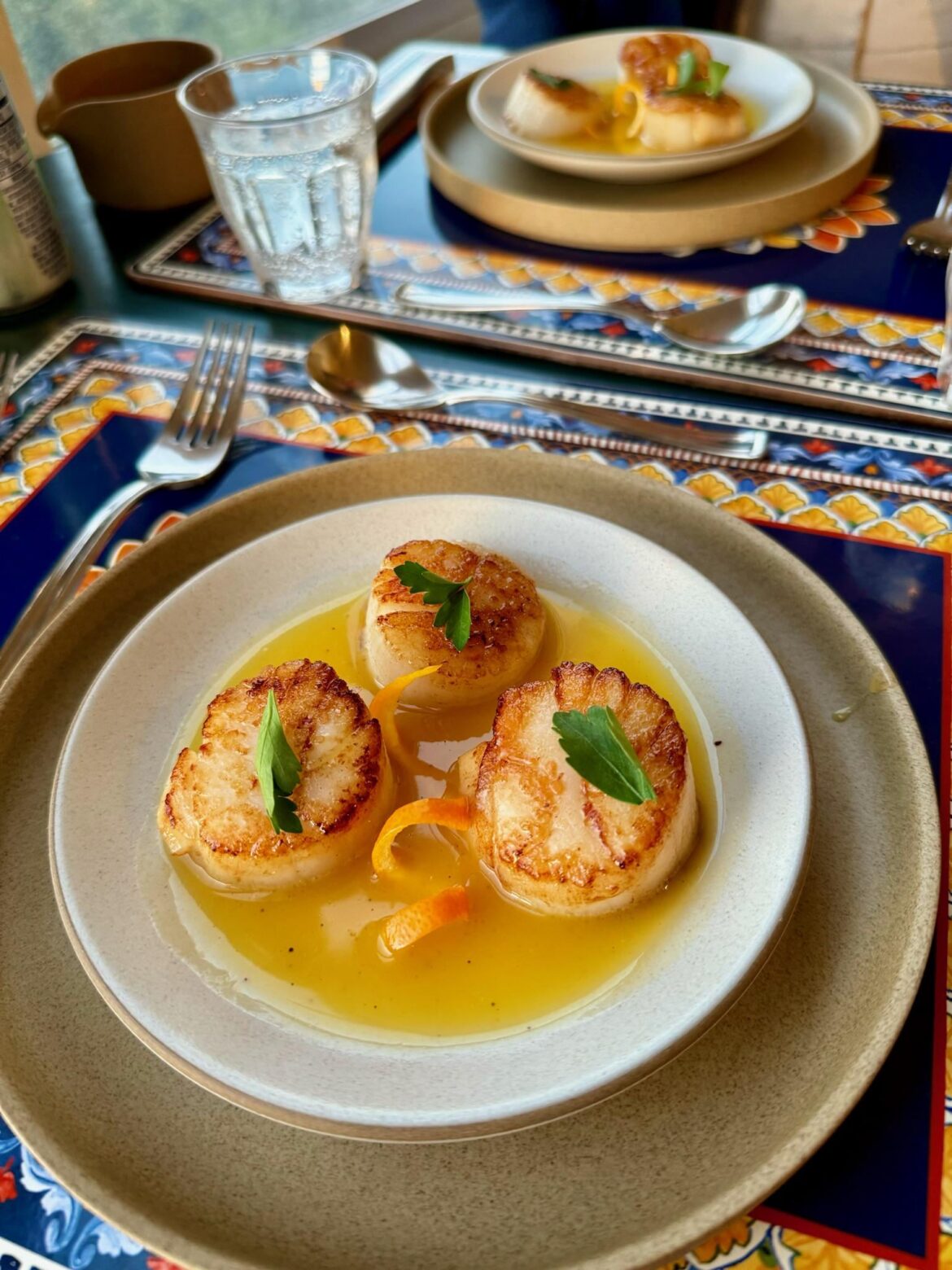 Pan seared day-boat scallops with orange beurre blanc