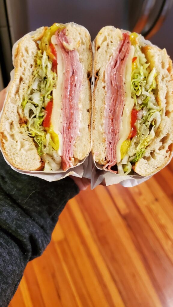 Italian sandwich on toasted ciabatta with melted aged provolone cheese, banana peppers and roasted red peppers.