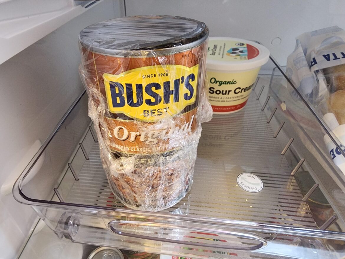 Saving half a can of beans for later.