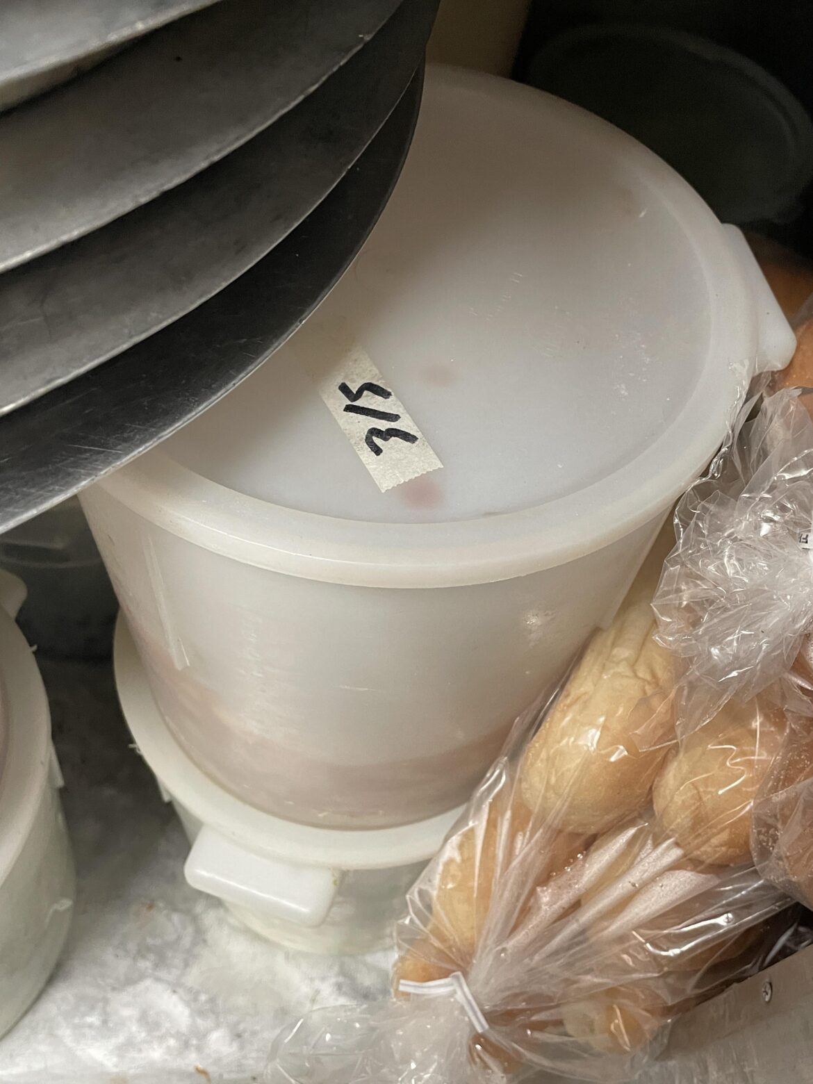 Despite everything wrong with this reach in, 2 week old chicken is not okay