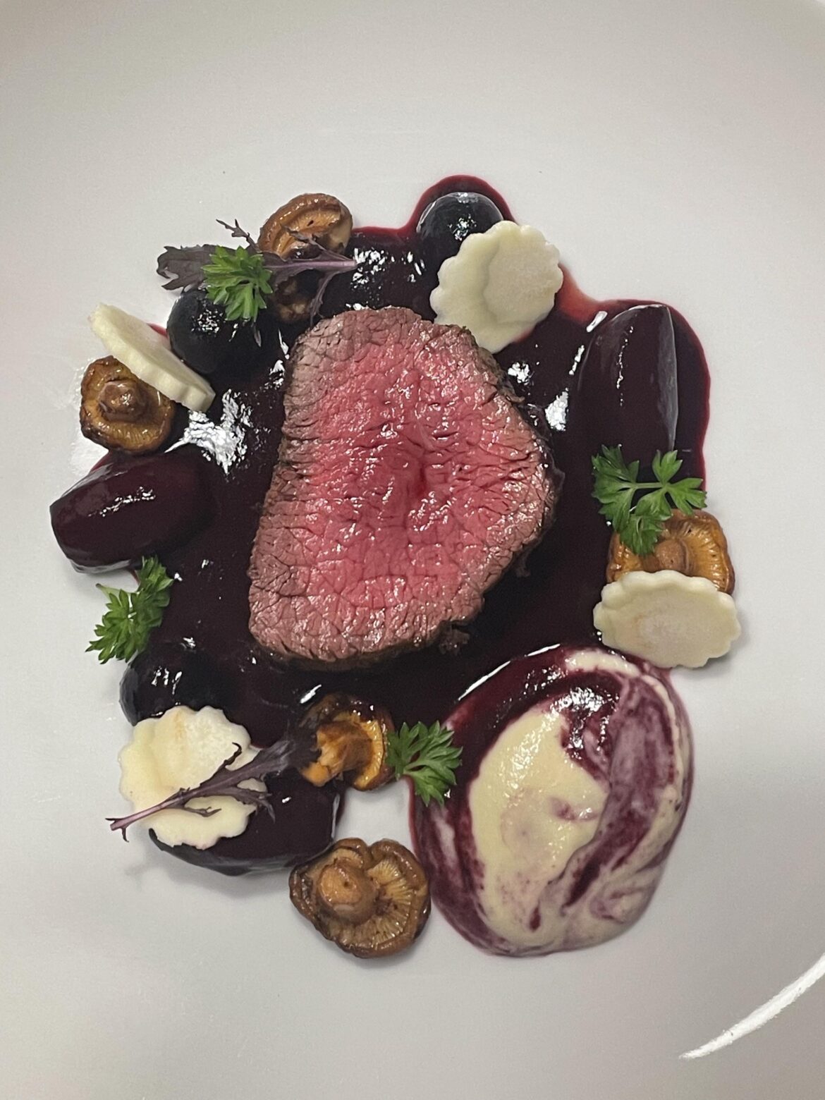Beef tenderloin/ Chanterelles/Concord Grapes/Parsnip