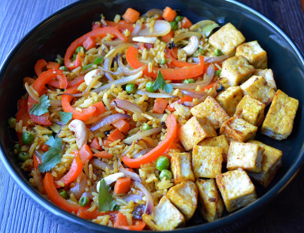 410 cal, 26 g protein. Biryani inspired stir fry with spiced tofu.