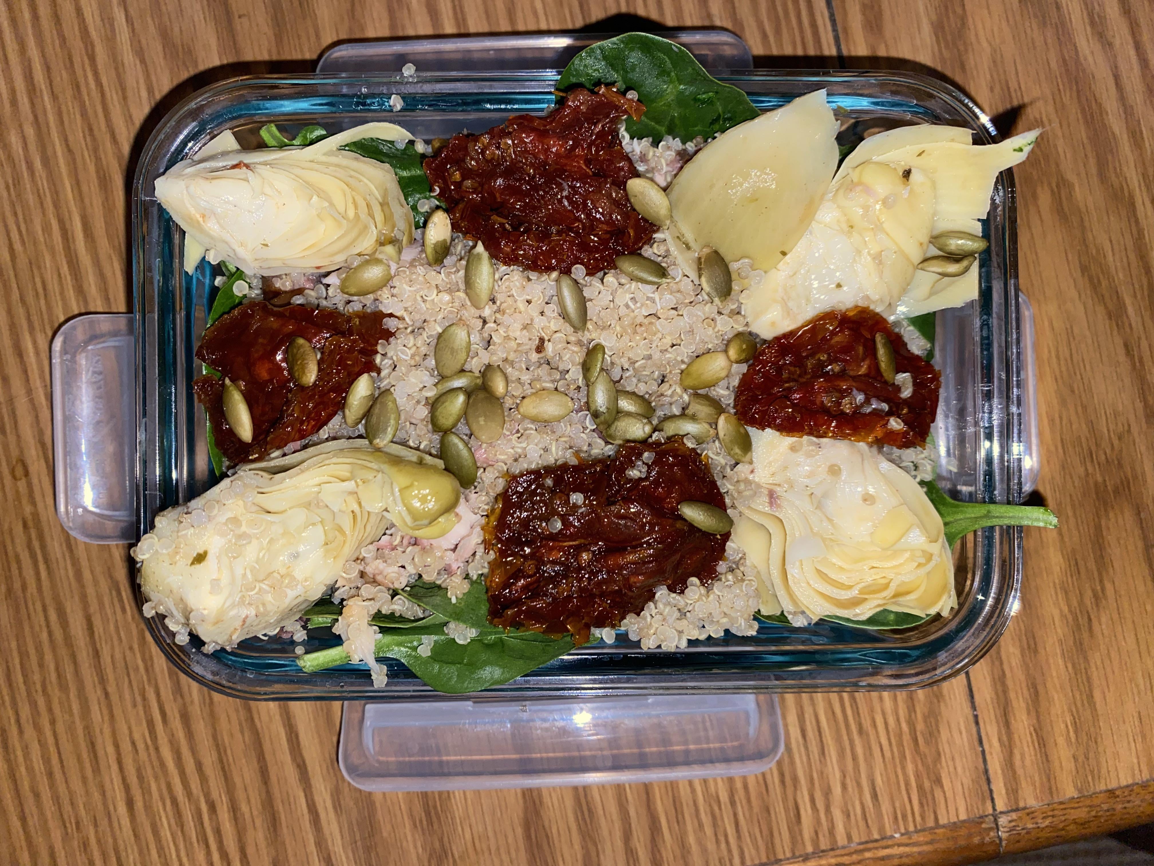 Using leftovers. A bed of spinach topped with quinoa and mackeral