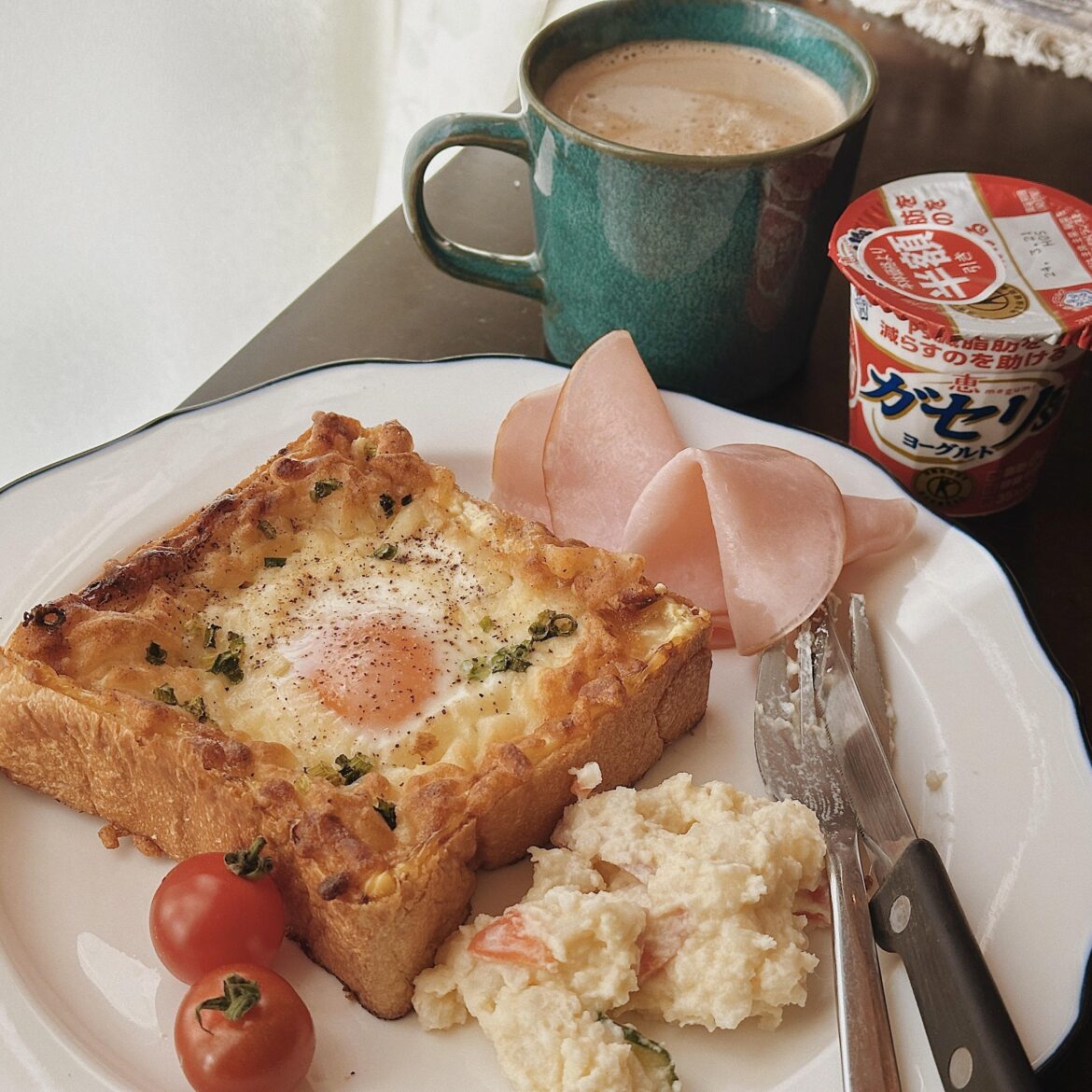 Eggs on buttered toast with cheese & a drizzle of honey