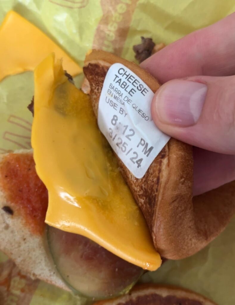 Found a sticker in my McDonalds cheeseburger today. What kinda hack is that expiration date?