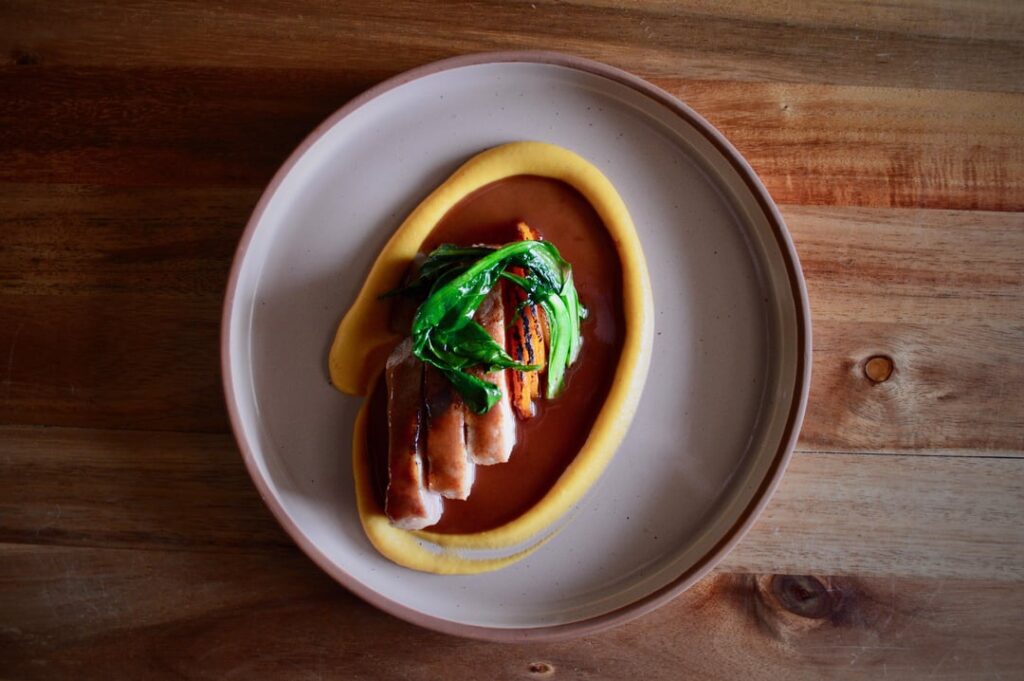 Berkshire Pork Loin, Butternut Squash, Dandelion Greens, Rioja Jus