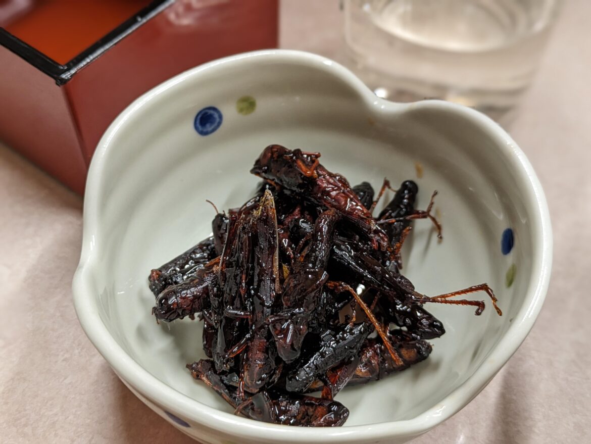 Locust tsukudani.
It is a traditional Japanese insect food.
