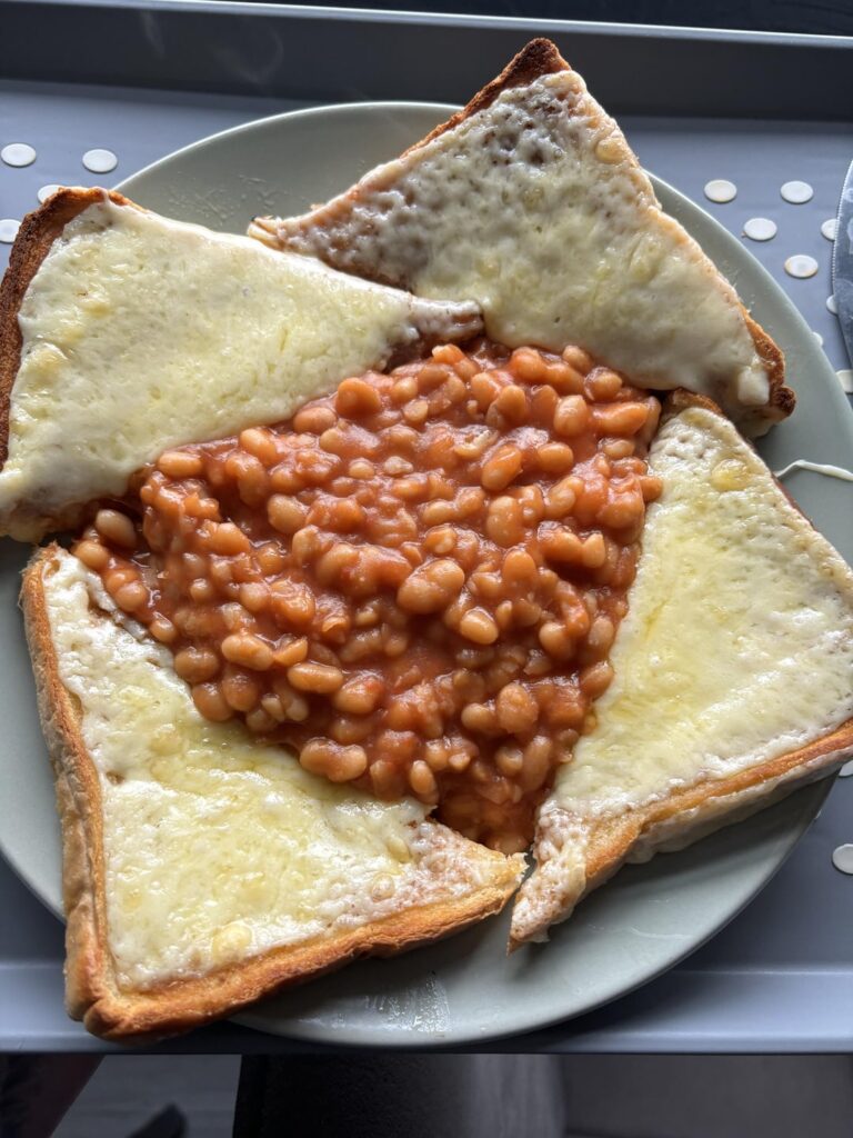Cheese on toast with beans for a late breakfast/Lunch
