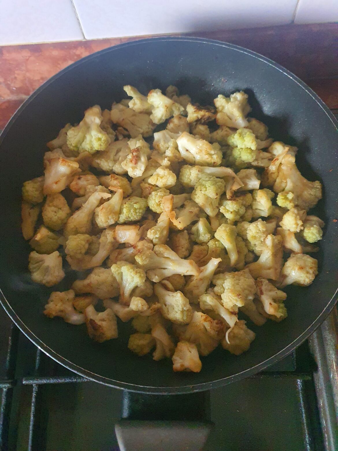 pan-fried cauliflower, with anchovies, chilli pepper, extra virgin olive oil, white wine