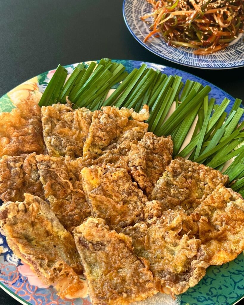 Pan fried beef and egg with Chily Green onion salad. (Korean Beef pancake, 육전&파절임)