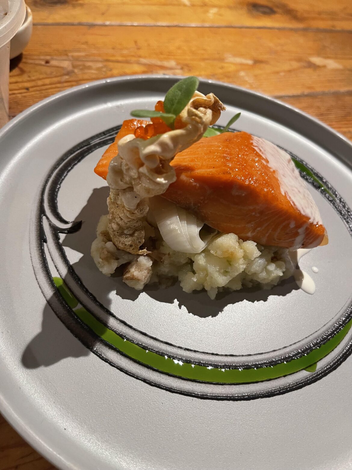 Trout, skin, roe, horseradish cream, squid ink, dill oil, wild spring onion champ.