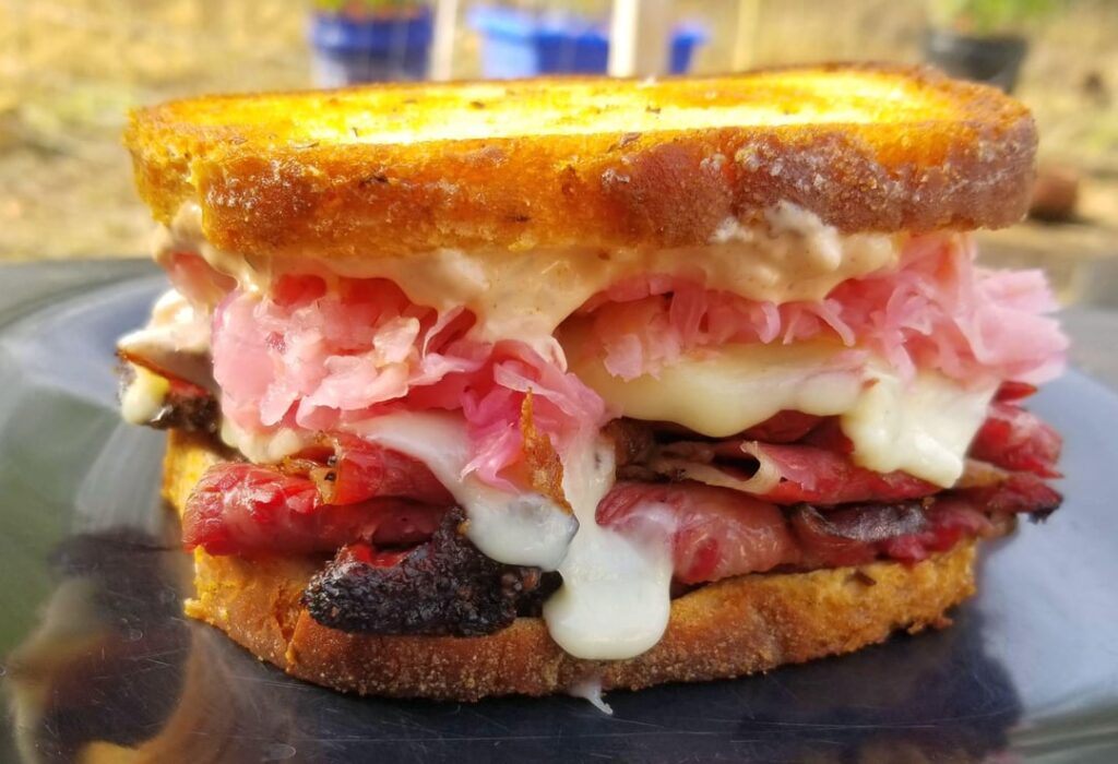 Pastrami and Coned Beef Reuben (Meat, dressing, and beet-juiced kraut all home made)