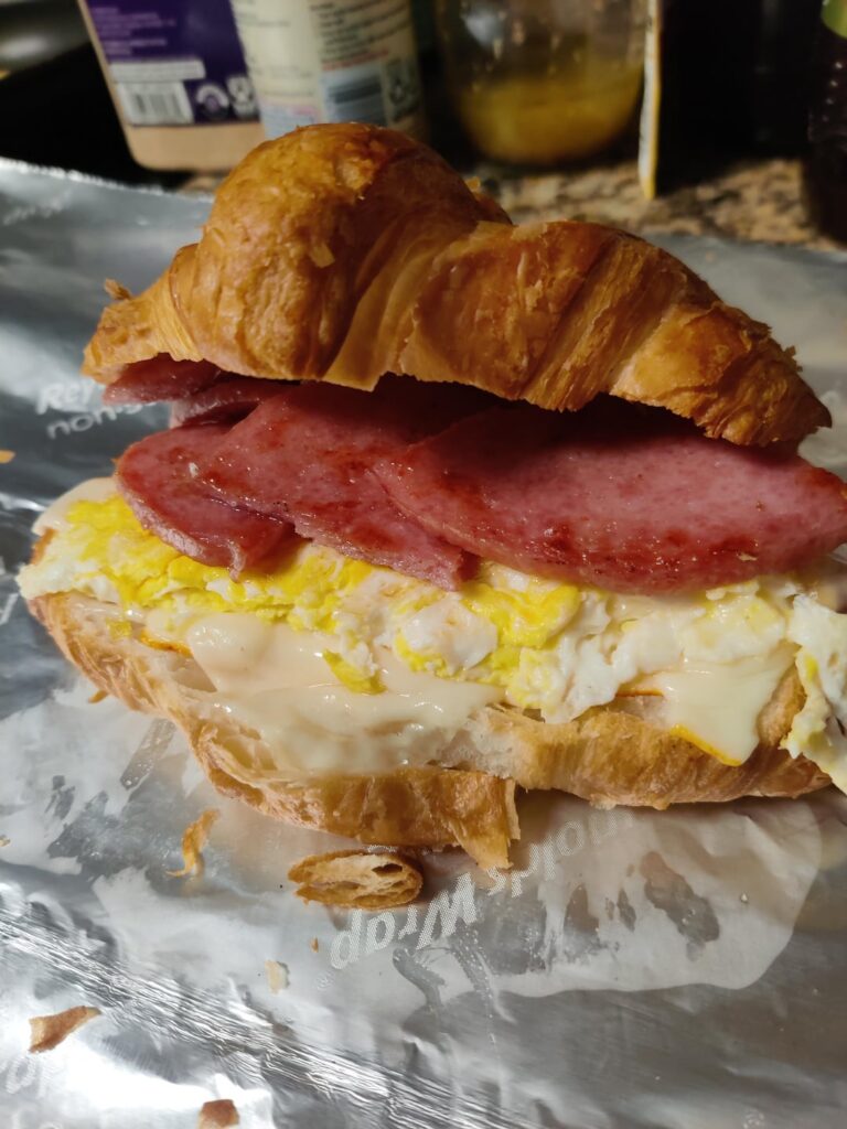 Tangy pork roll, egg & cheese on a croissant.