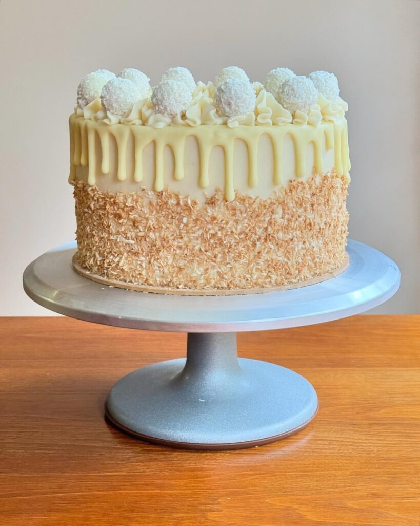 Coconut layer cake with coconut custard filling and cream cheese icing