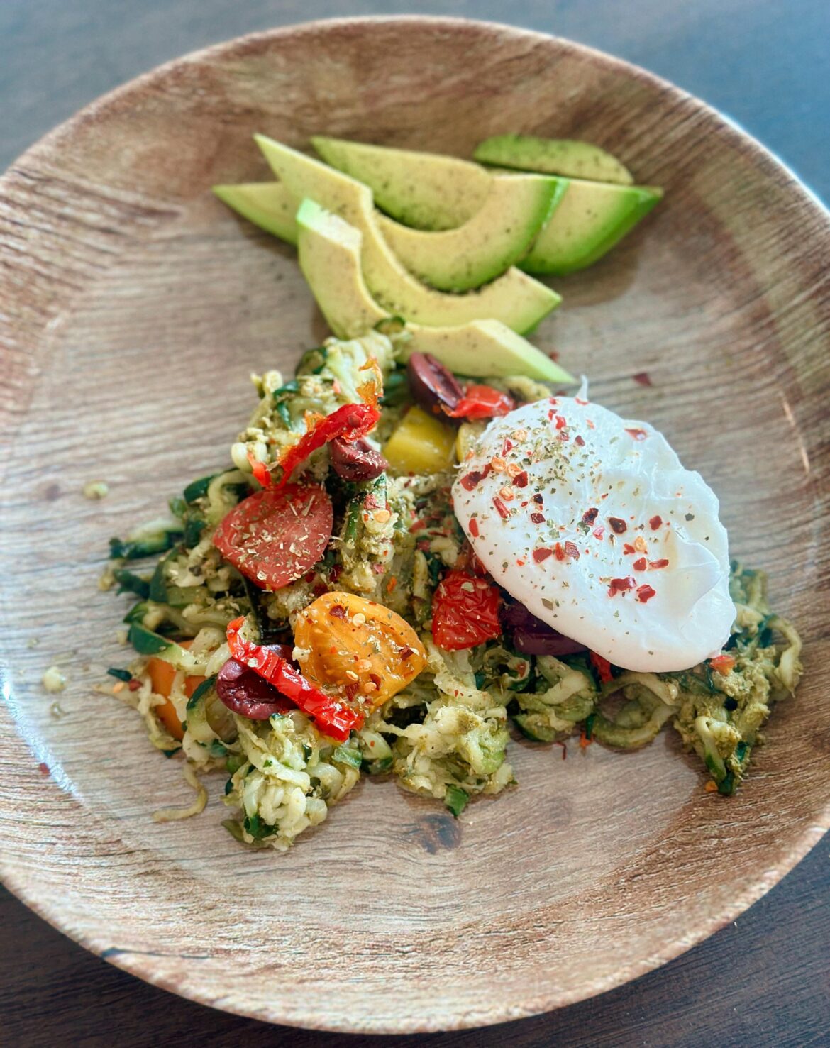 Pesto zucchini noodles with a poached egg!