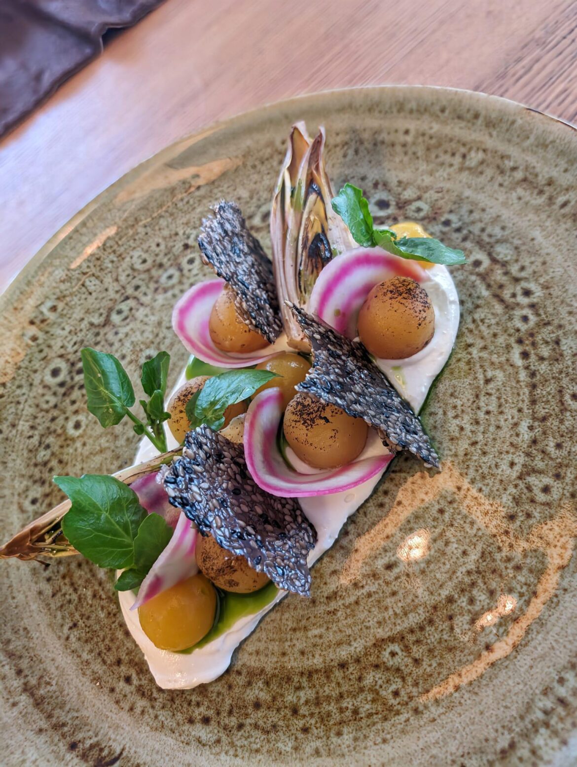 Vegetarian starter: Roasted yellow beetroot|Passionfruit| Tahini-goats cream cheese| Mint-oil| Grilled endives| Chioggia beets| Sesame crisp