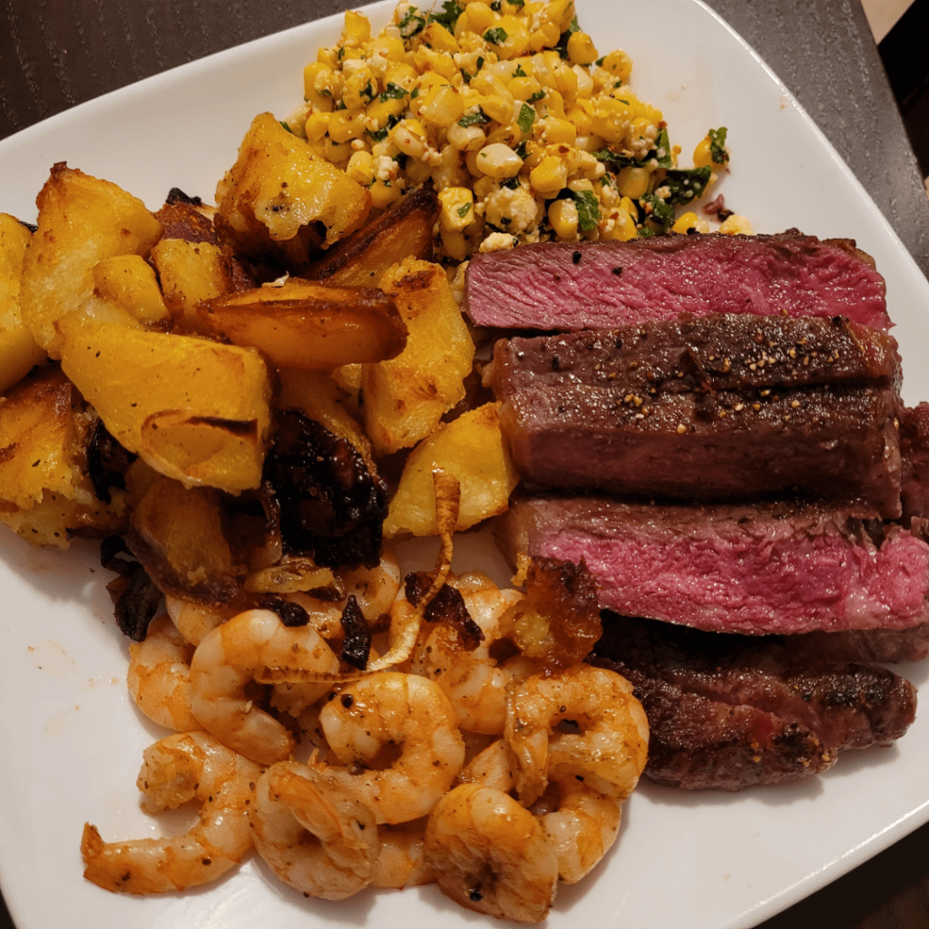 Plate for my boyfriend. I swear that potato wasn't as burnt as it looks!