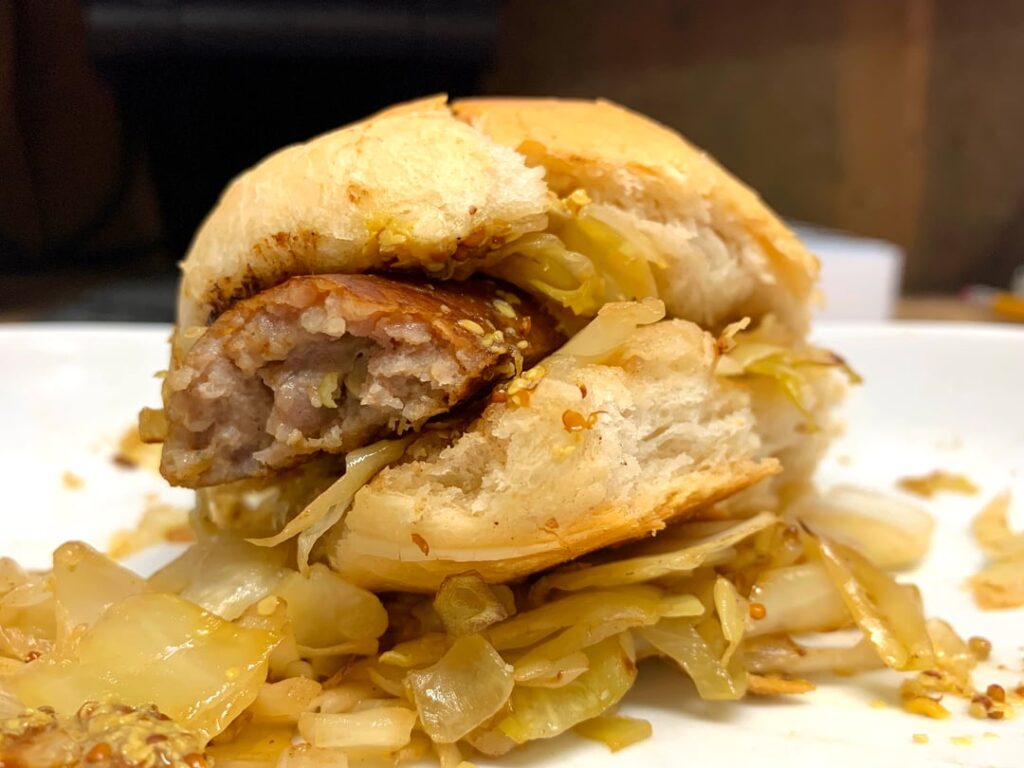 Sauerkraut and Wurst on fresh Brötchen. All homemade.