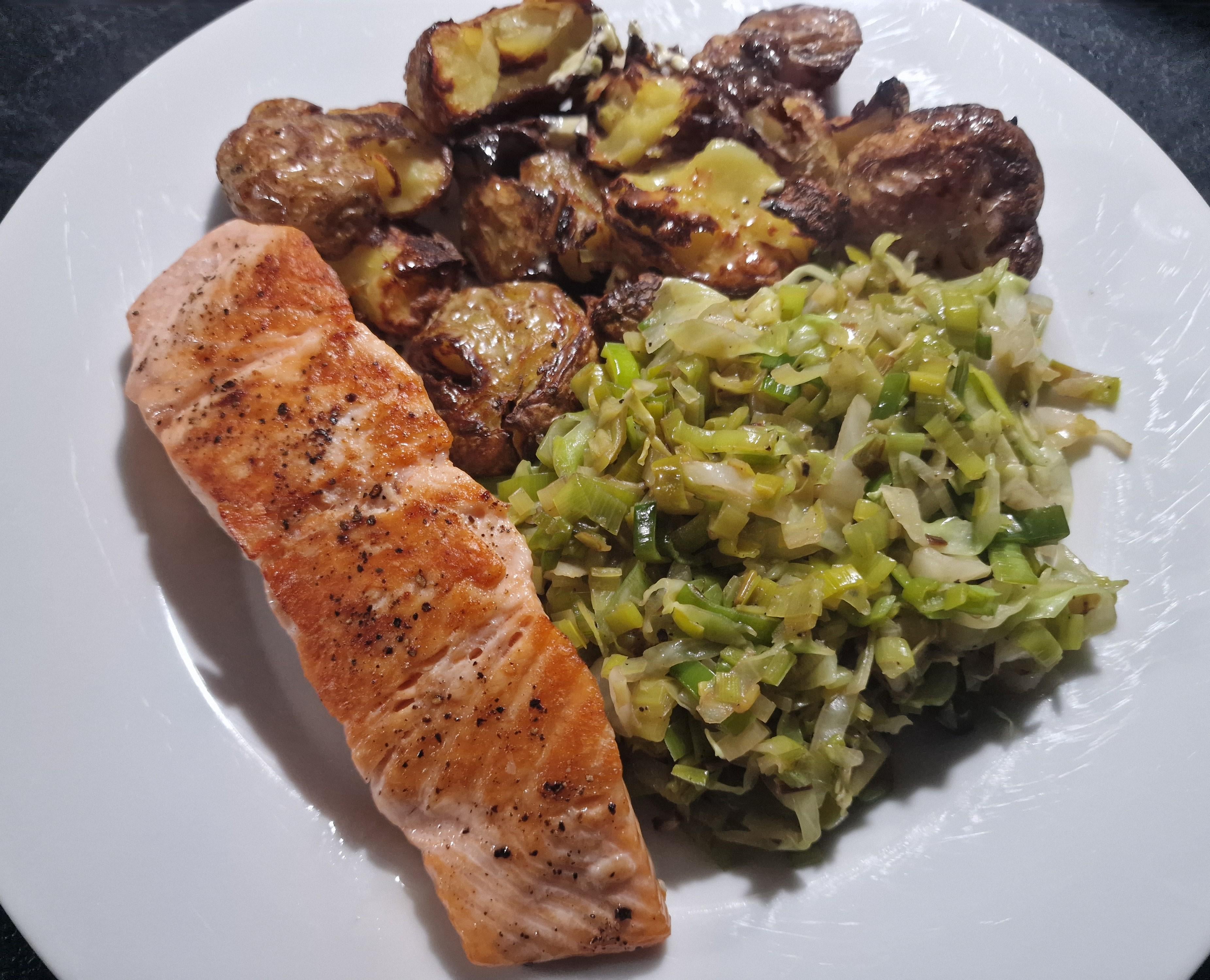 Salmon, fried leek and cabbage, roasted mini potatoes - Dining and Cooking