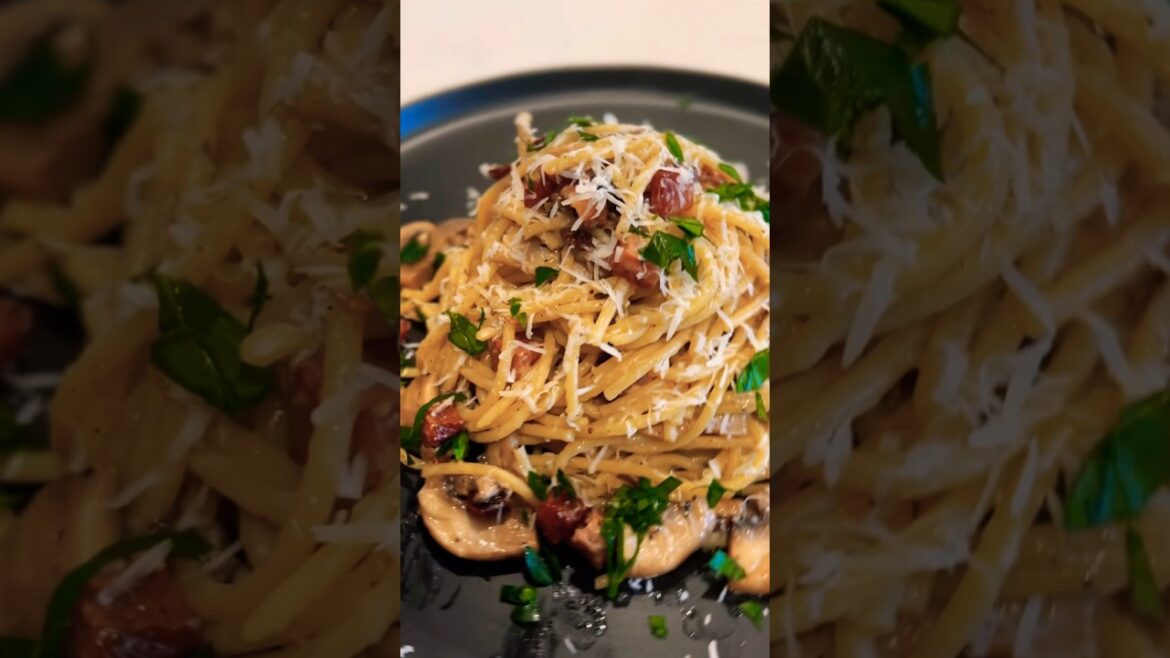 "Spaghetti Cacio e Pepe with Black Pepper, Mushrooms, Pancetta, and Pecorino Romano Cheese"