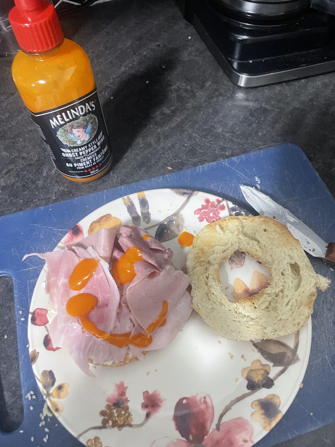 Simple yet significant; Fairmont Montreal bagel, triple meat blend, Melinda’s creamy ghost pepper sauce, and a bed of cream cheese.