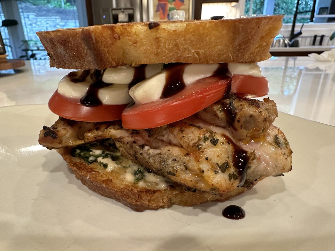 Grilled chicken caprese sandwich on Tuscan bread