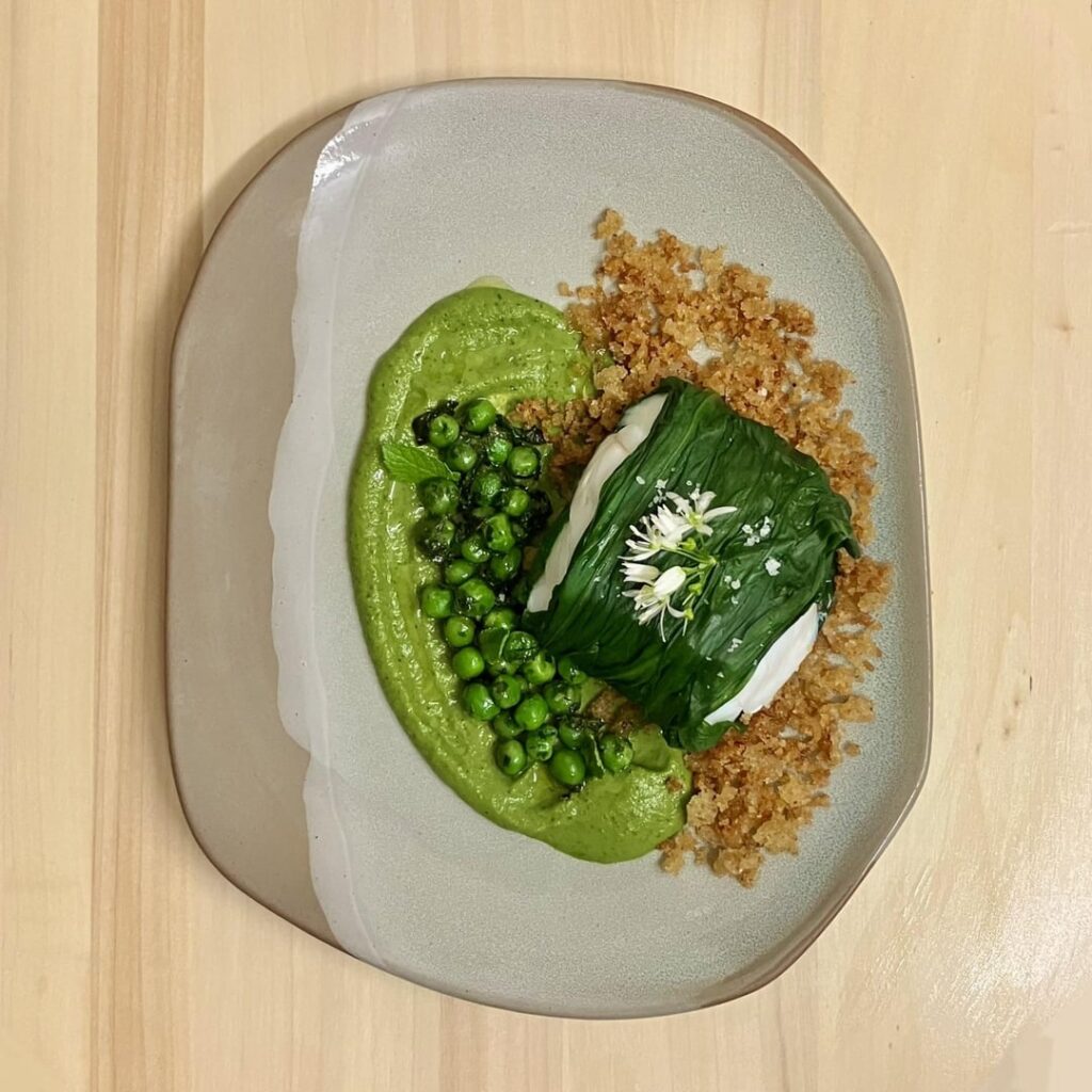 Steamed Cod wrapped in Wild Garlic, Pangrattato and Truffle, Pea, Mint Purée