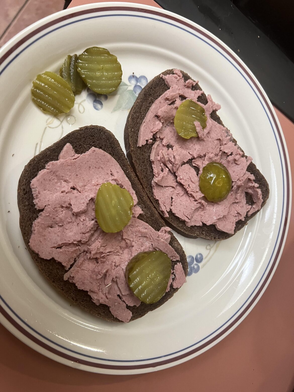 a bomb victorian meal (pumpernickel rye bread, liverwurst, pickles)