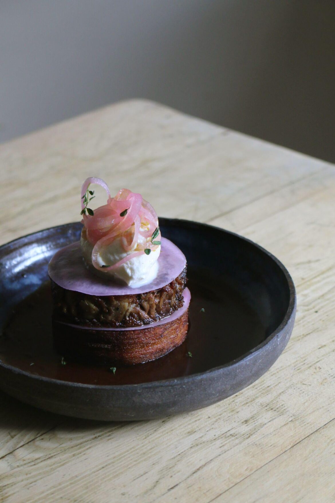 Lamb neck terrine, potato terrine, pickles and smoked whipped ricotta