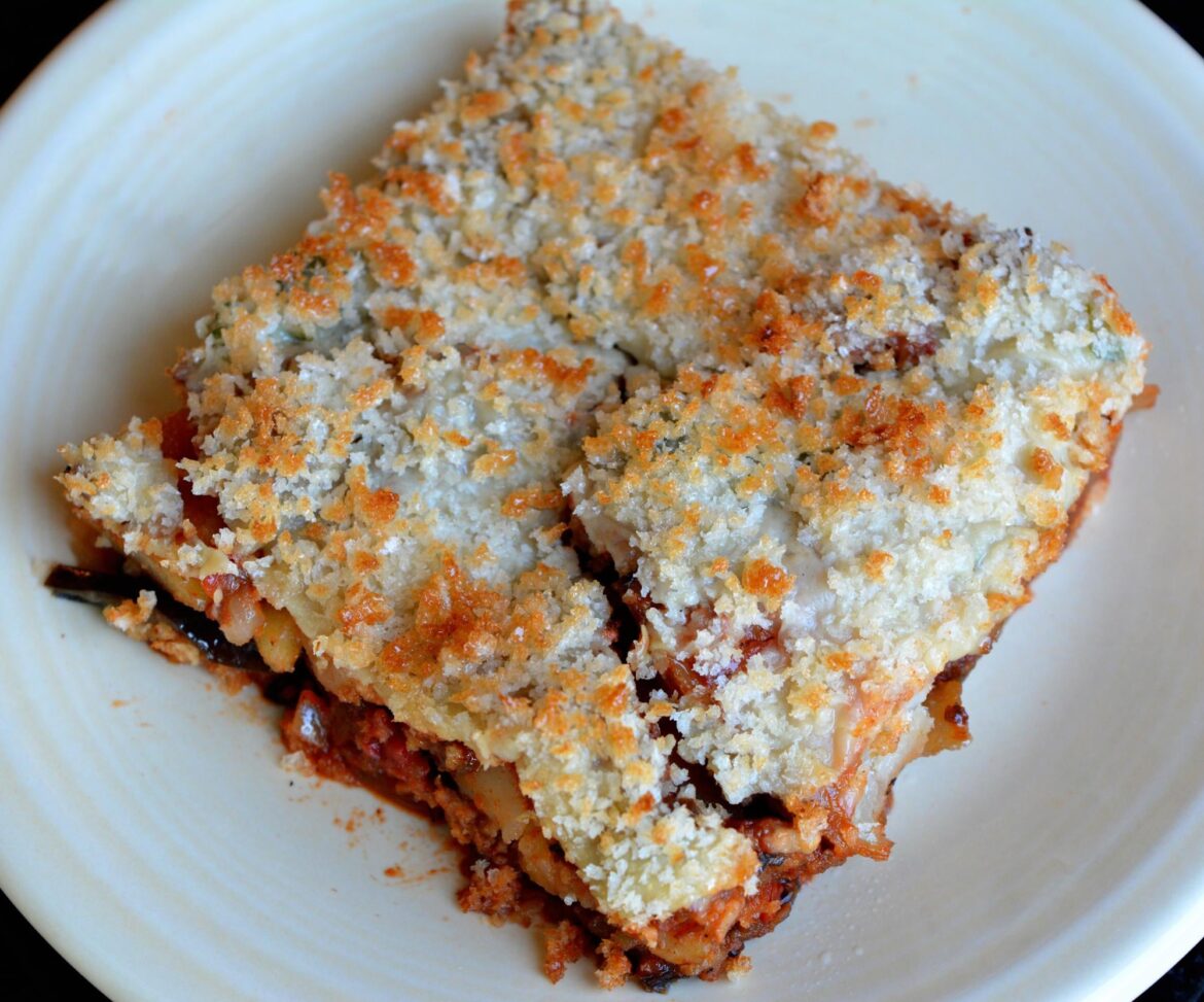 183 cal / 10P per serving. Moussaka (Greek Lasagna with eggplant, potato, onion, beyond meat, spices, tomato, béchamel and panko topping)