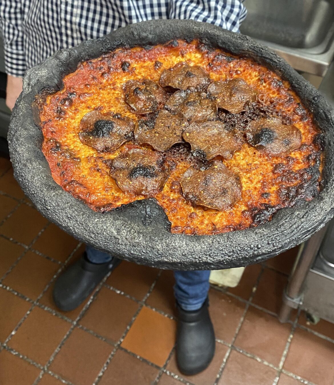 The obvious crime is forgetting the pizza, but I think the topping placement should be thrown in as well