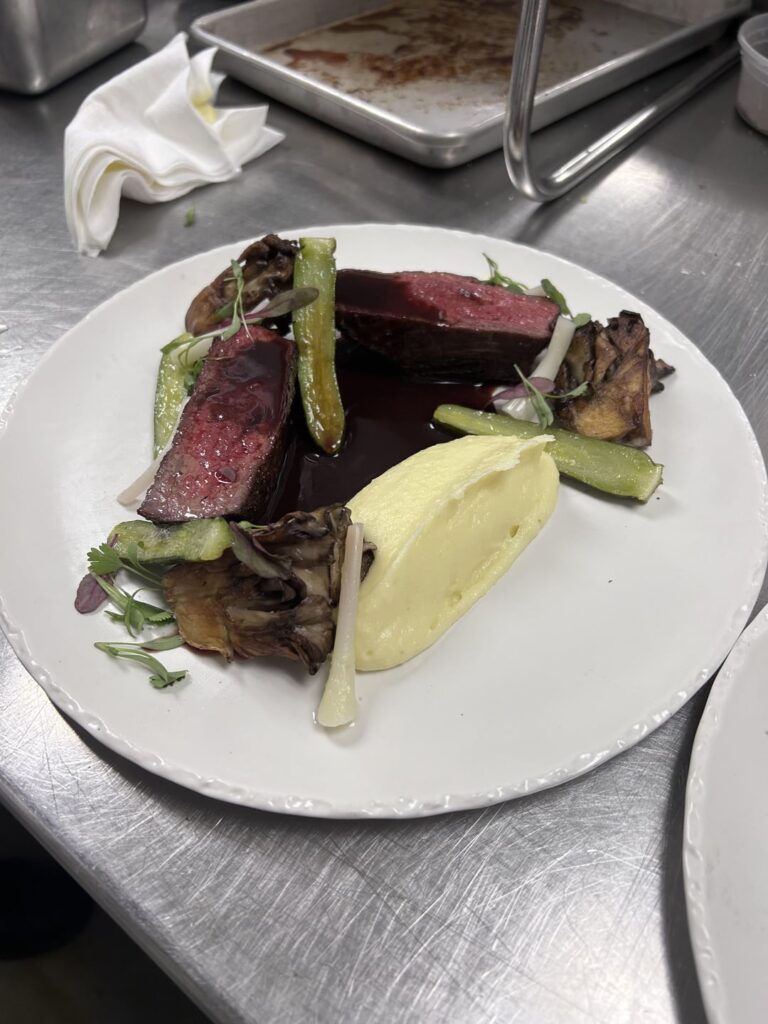 Playing around at work and made a sirloin cap, potato puree, maitake, poached squash, pickled ramps, and a bordelaise sauce.