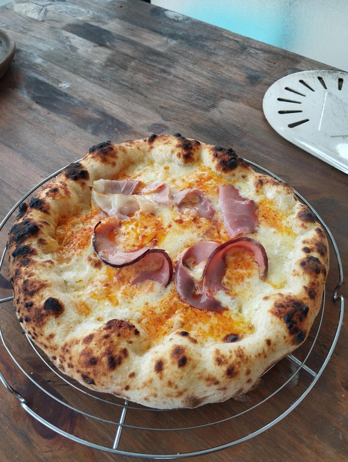 Poolish, Isigny cream base, red pesto, pecorino, fior de late & speck