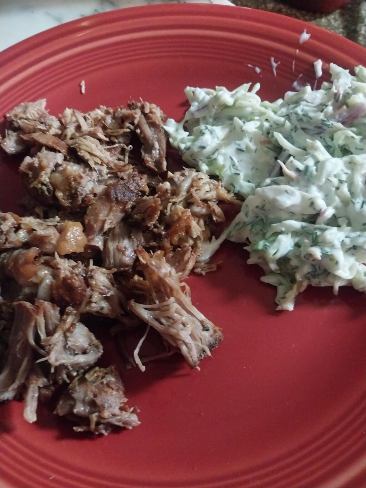 The pulled pork finished product with some primo cole slaw from a local restaurant.