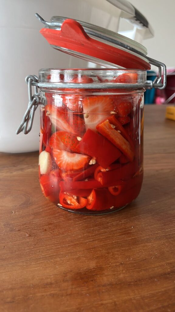 What's cracking my peppers! I've recently made fermented pepper strawberry hot sauce!