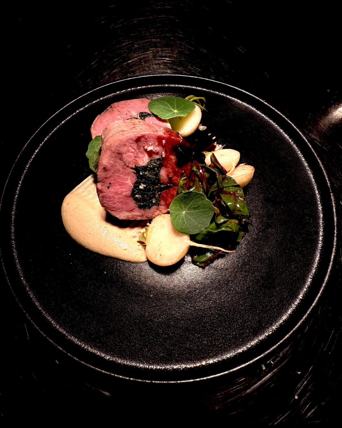 Stuffed lamb saddle, celeriac purée,  sugo d’arrosto