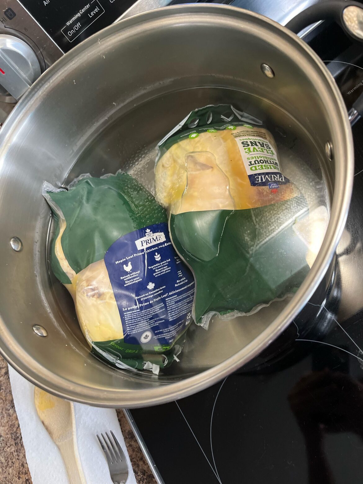 Father boiled chicken in a bag