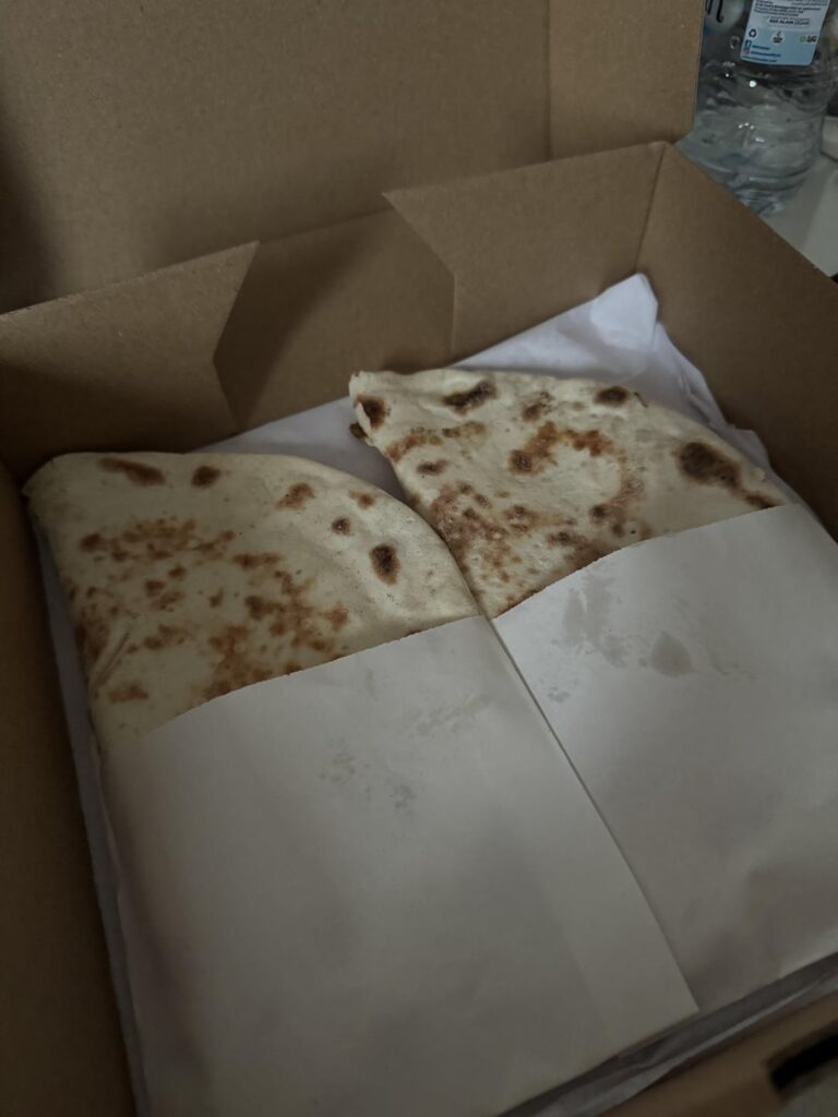 estimated calories in one cheese manakish?