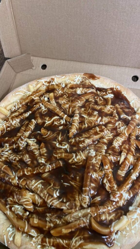 Local pizza joint had this. They called it "poutine pizza"