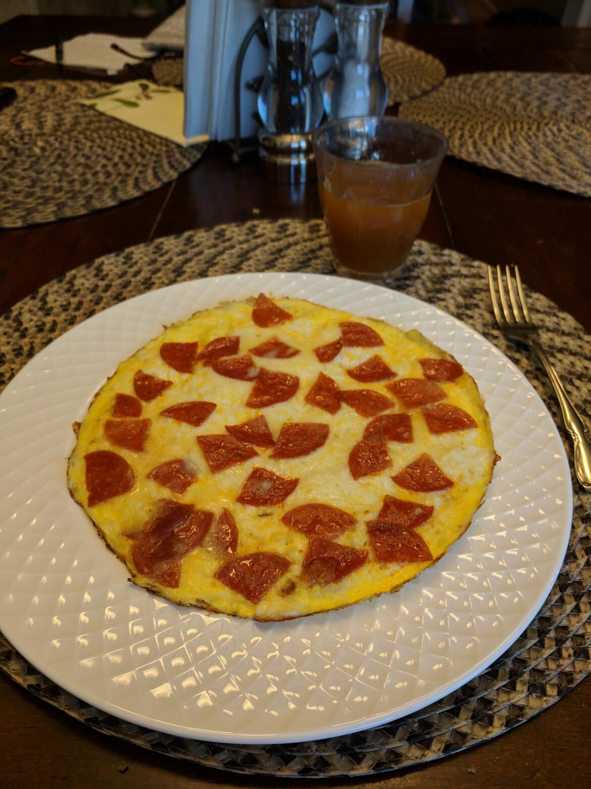 Five years ago I was craving pizza but had none. I made this egg crust, mozzarella, and peperoni "Pizza".