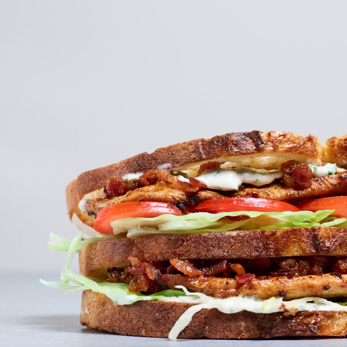 Chicken, bacon jam, herb mayonnaise, lettuce, tomato and sourdough bread
