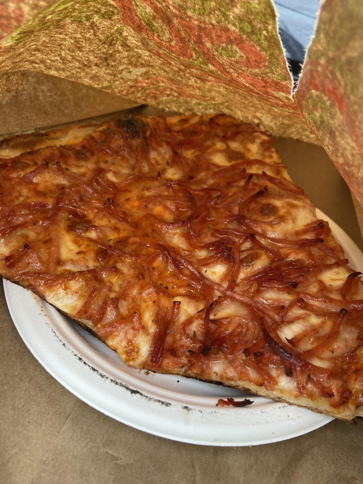 Pepperoni slice with pepperoni cut into slivers. Crime or not?