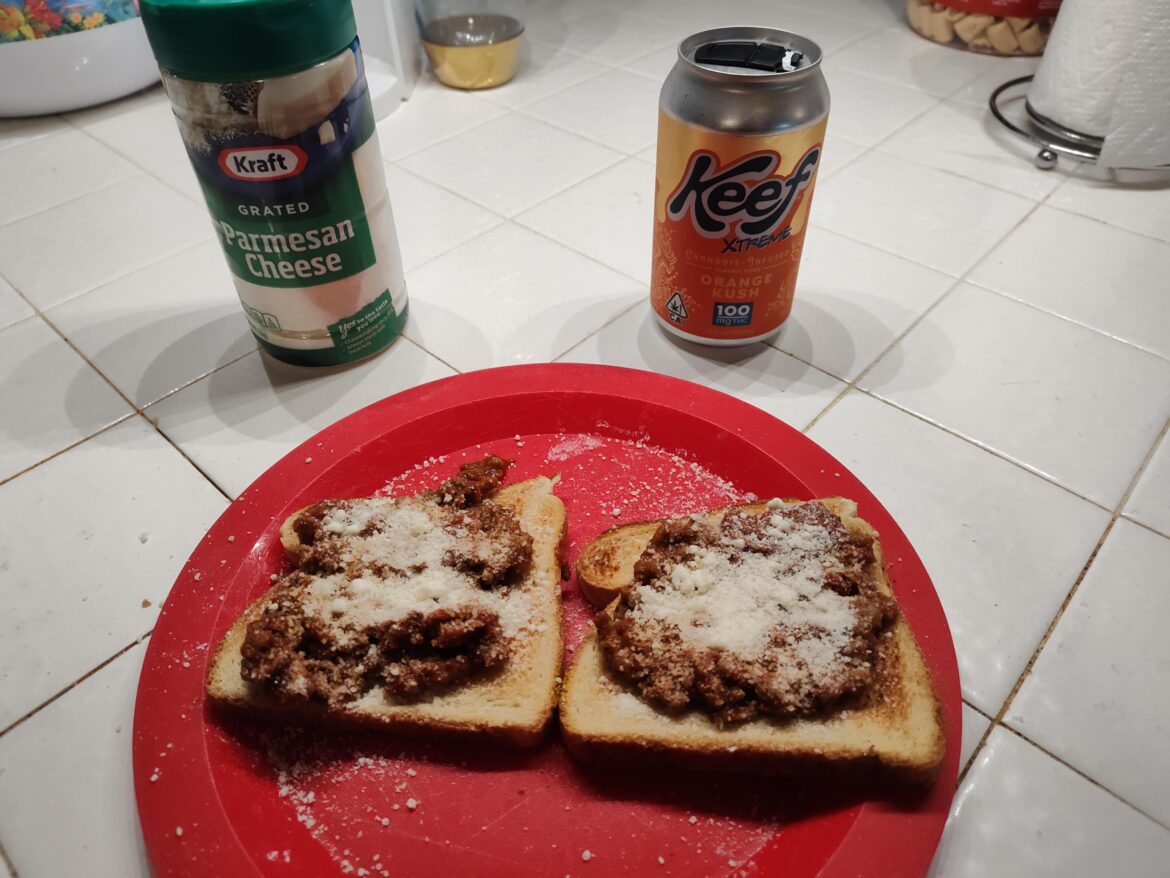 Meat spaghetti sauce over toast with Parmesan cheese. Breakfast of champions.
