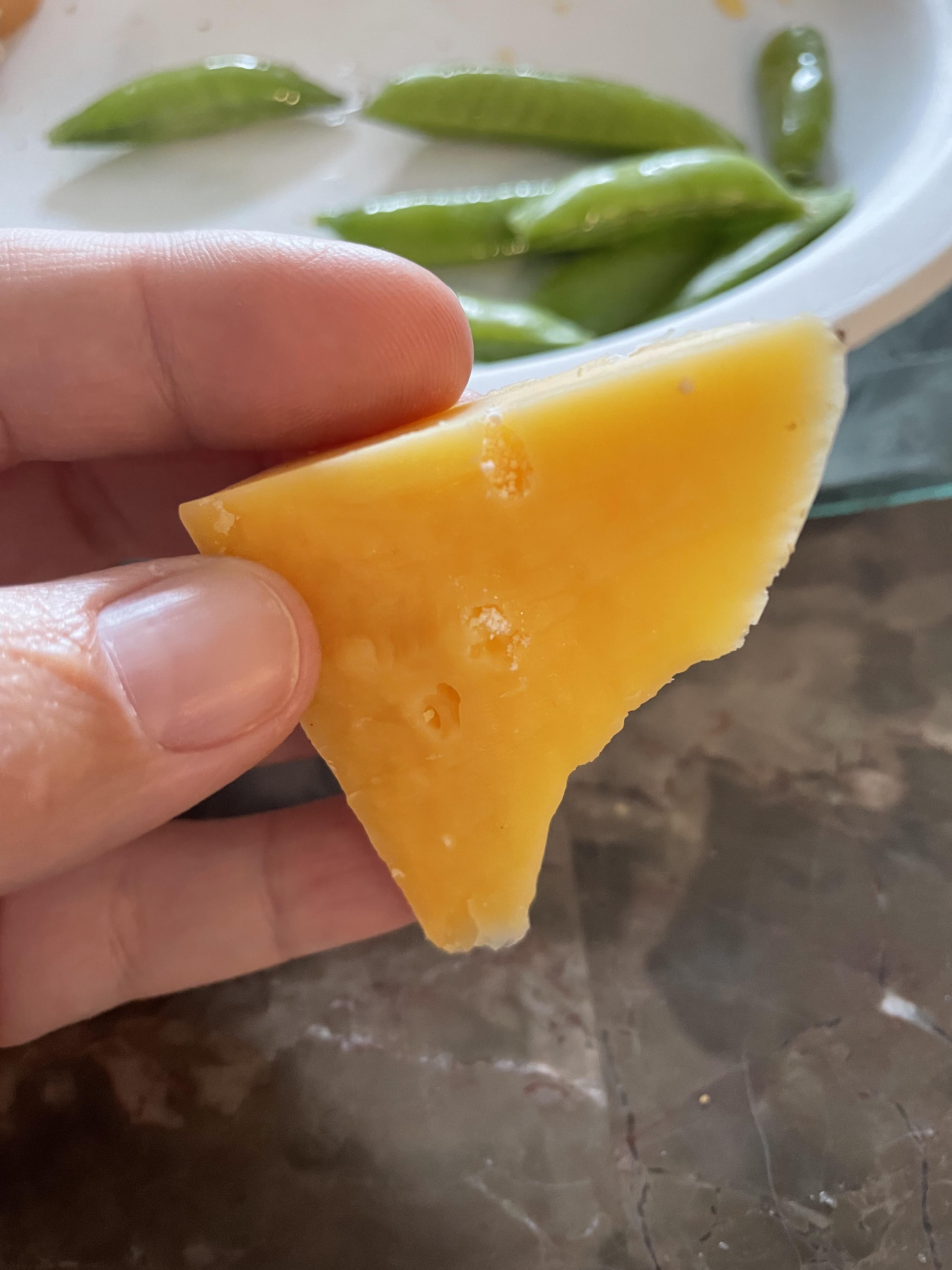 What are these crunchy white crystals in cheese? Dining and Cooking