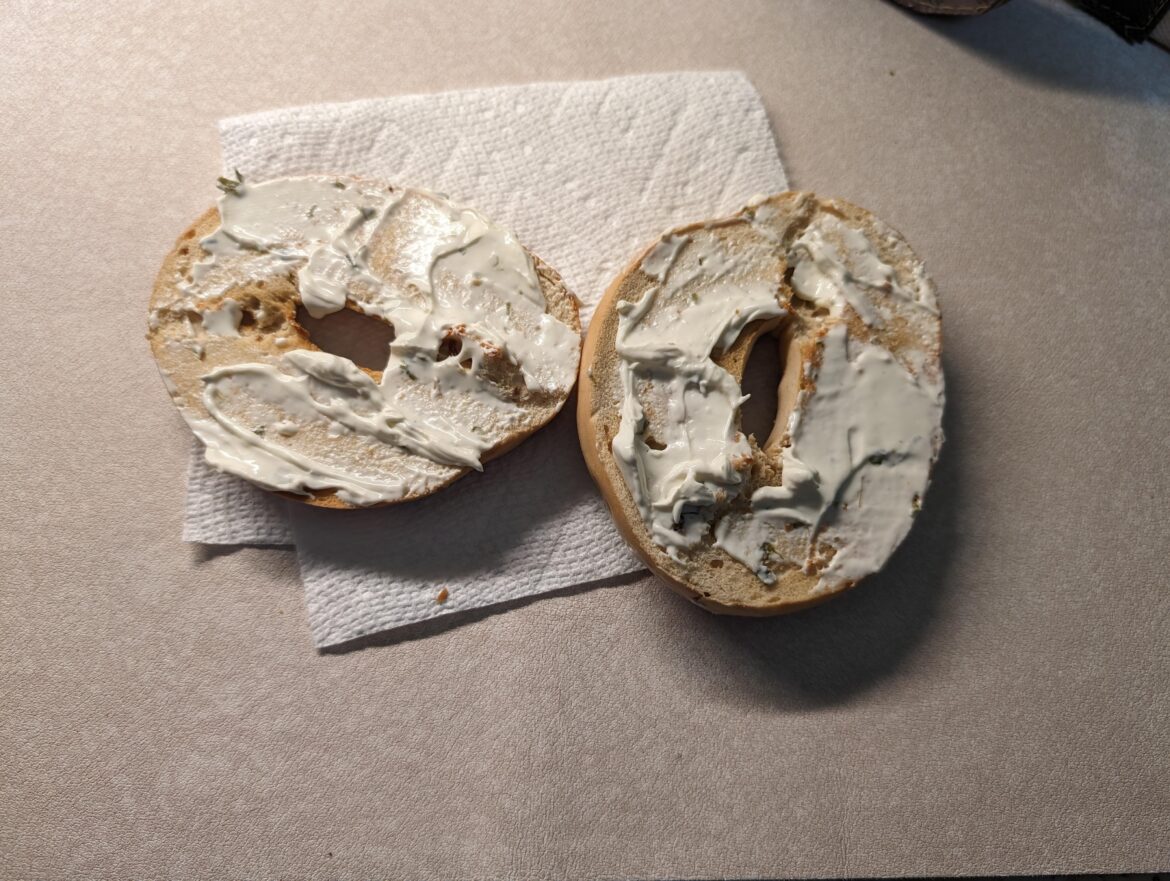 Onion bagel with onion and chive cream cheese spread