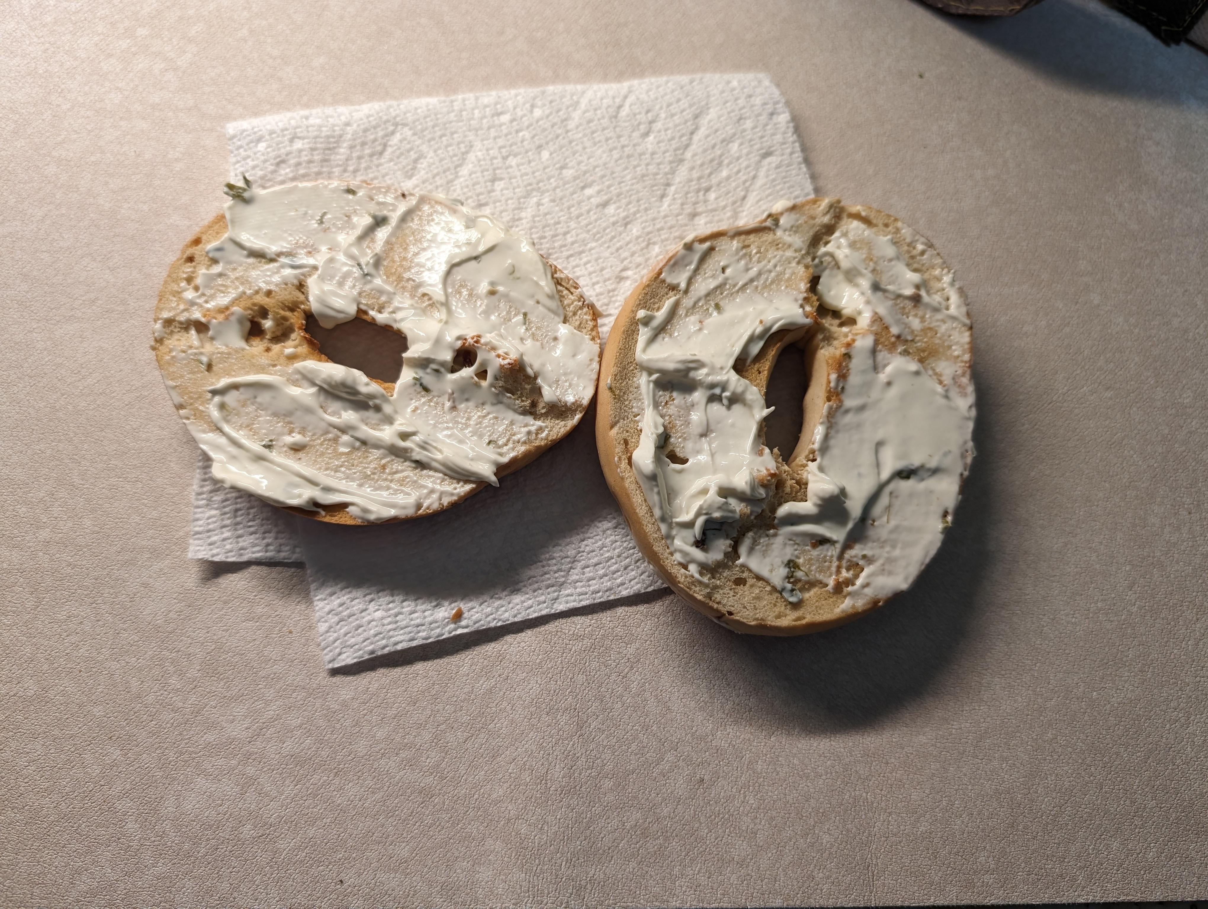 Onion bagel with onion and chive cream cheese spread Dining and Cooking