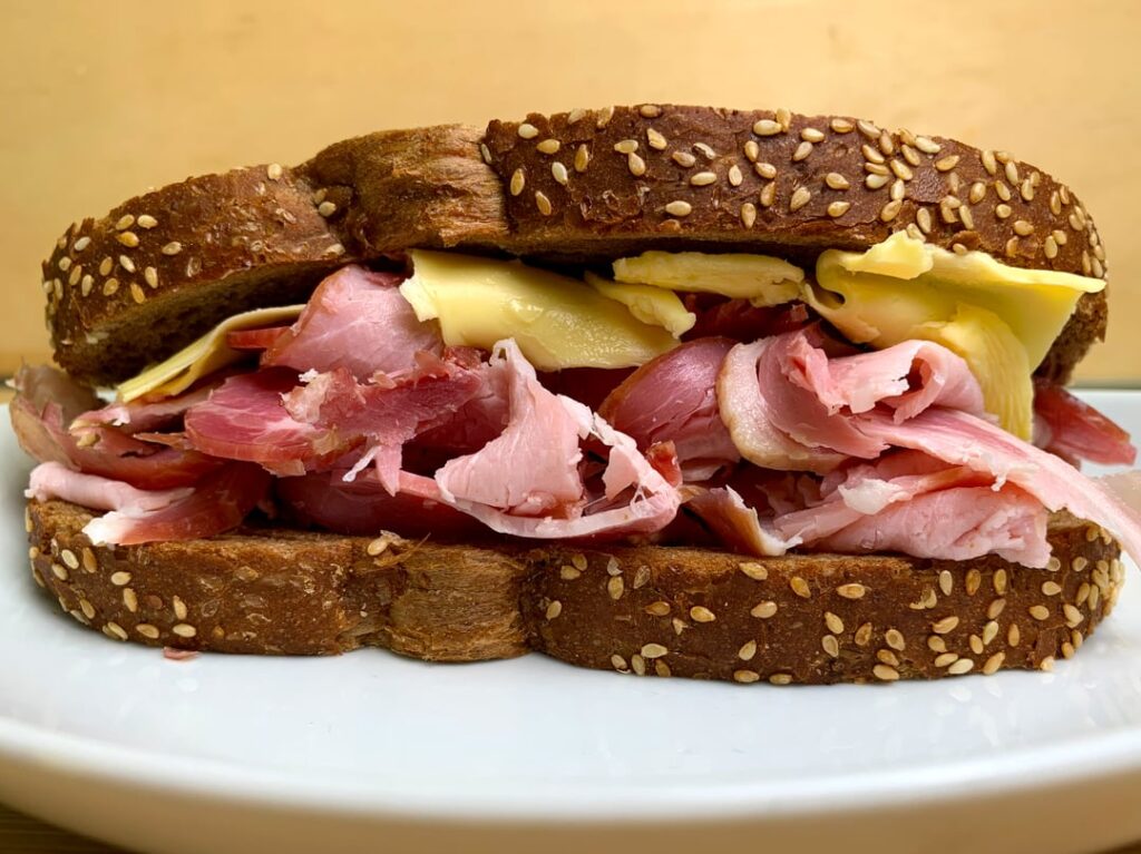 Dry cure smoked pork loin with Kerrygold on Pumpernickel Rye