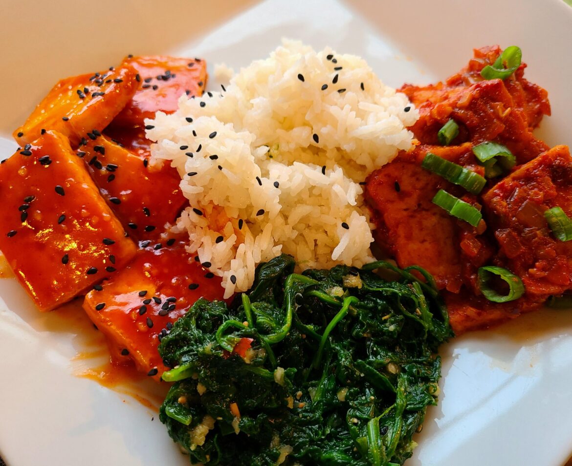Three Korean dishes - braised tofu, spinach with doenjang, and sweet & spicy tofu.