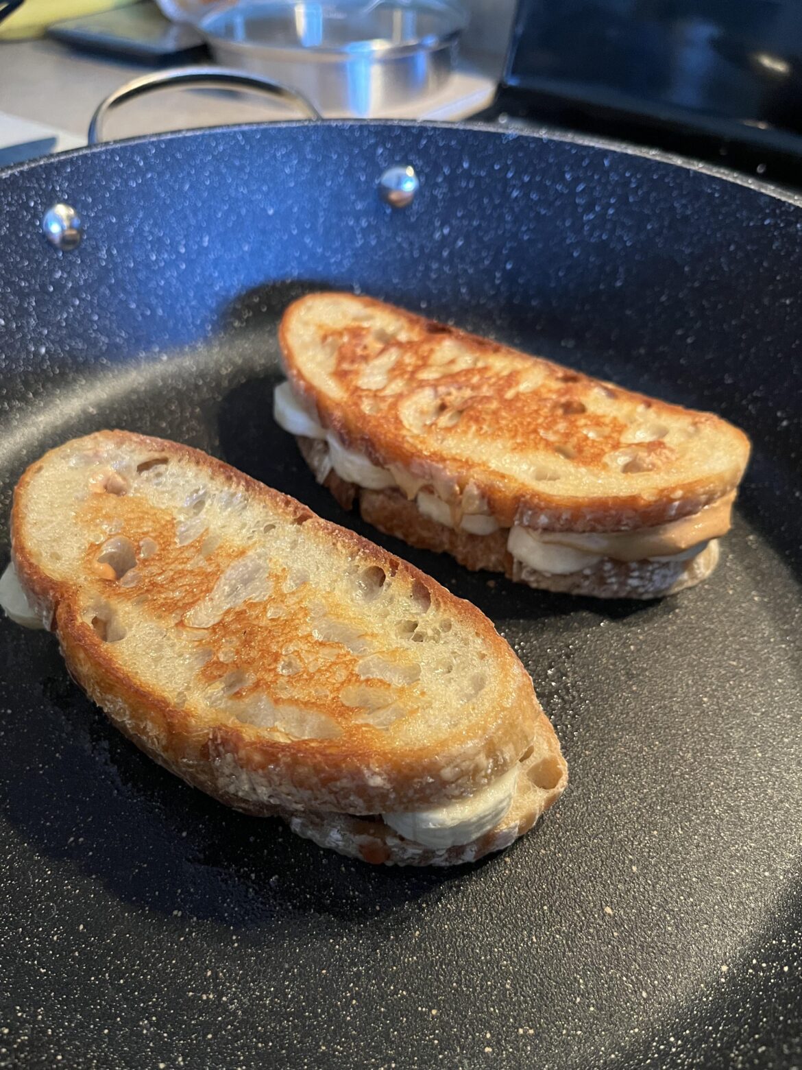 Pan fried peanut butter and banana sandwiches with honey!