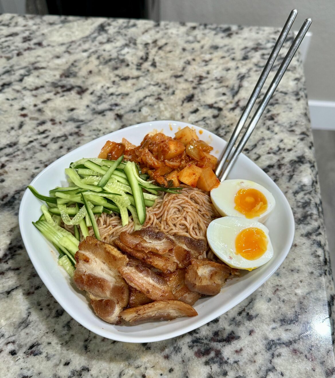 Bibim Naengmyeon with Pork Belly, Kimchi, Cucumber & an Egg